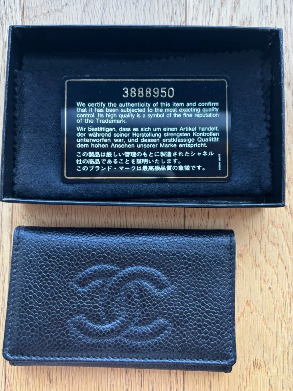 Authentic CHANEL Black Leather 6-Key Holder | Gold Hardware